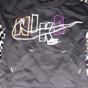 A Nike onesie,bottles haven’t been used